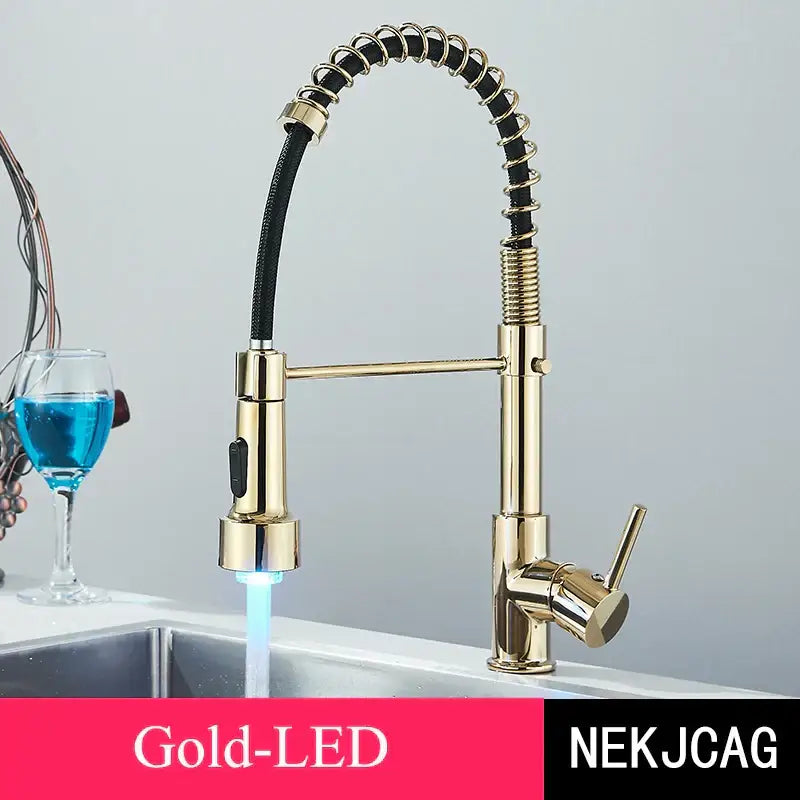 Brushed gold led kitchen faucet with black spring pull down hose and flexible coiled design by decorbites