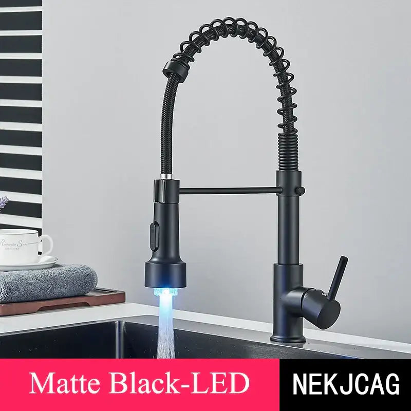 Matte black led kitchen faucet with flexible coiled spout in contrast to decorbites brushed gold led kitchen faucet design
