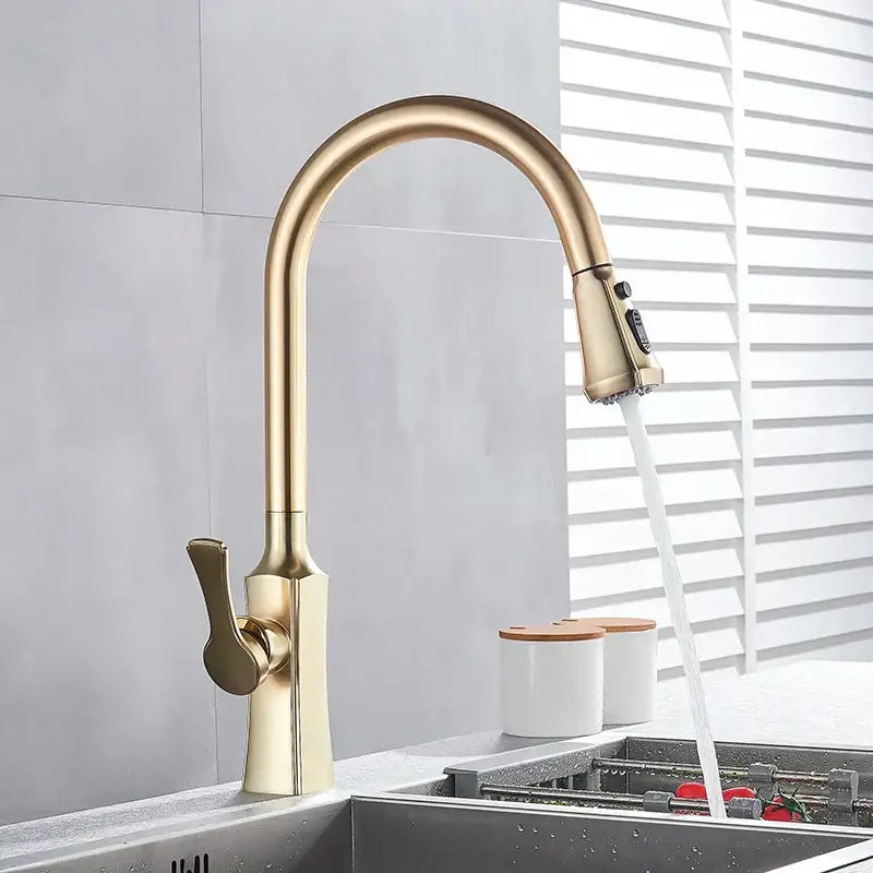 Brushed gold pull out spray kitchen faucet with sleek curved spout by decorbites for modern kitchen use