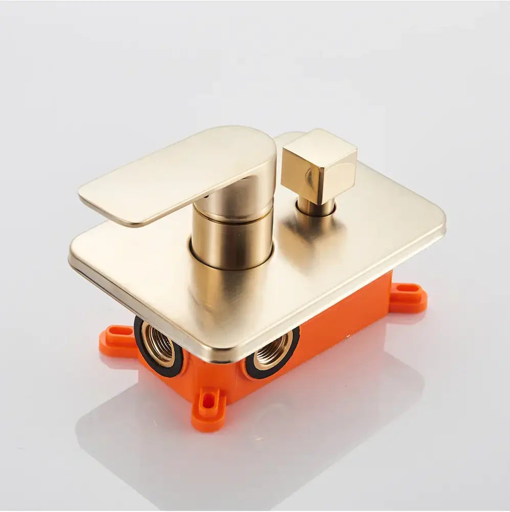 Brushed gold shower faucet with rectangular wall-mounted design and orange plastic base by decorbites brushed gold