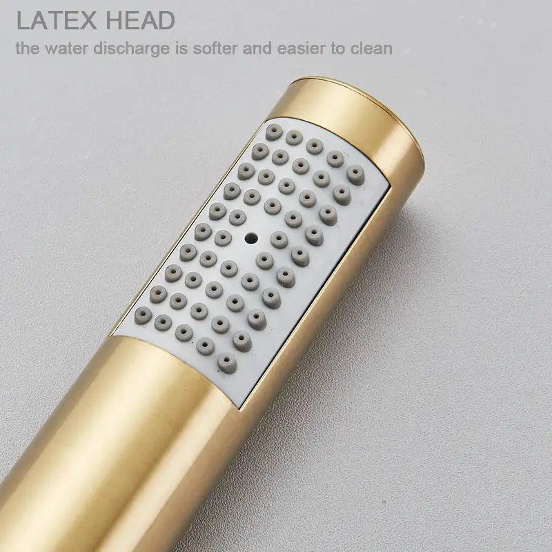 Brushed gold round hand shower by decorbites with gold finish and white latex head featuring gray nozzles for soft water discharge