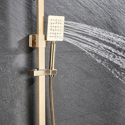Brushed gold shower mixer with a gold-toned rectangular rainfall head and handheld spray mounted on a vertical rail system