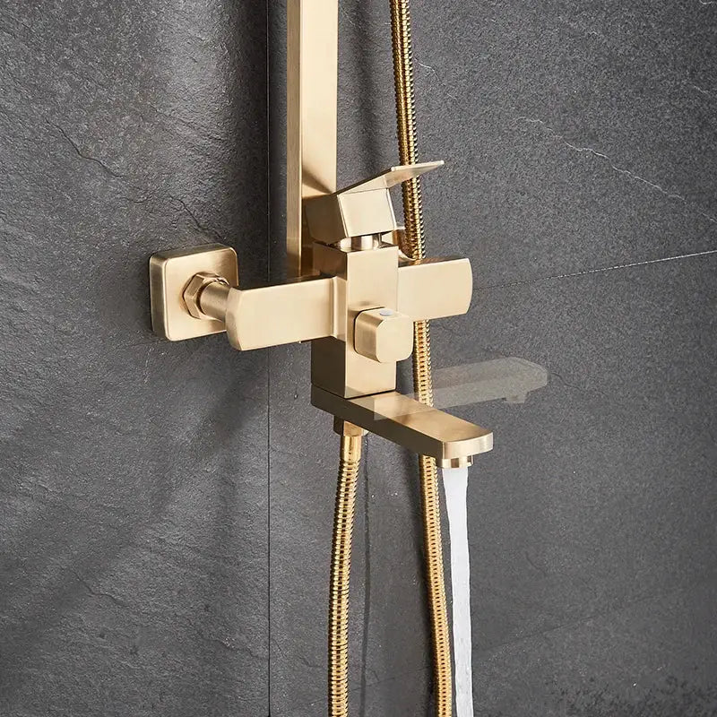 Brushed gold shower mixer with sleek angular design and matching handheld spray by decorbites for modern bathroom decor