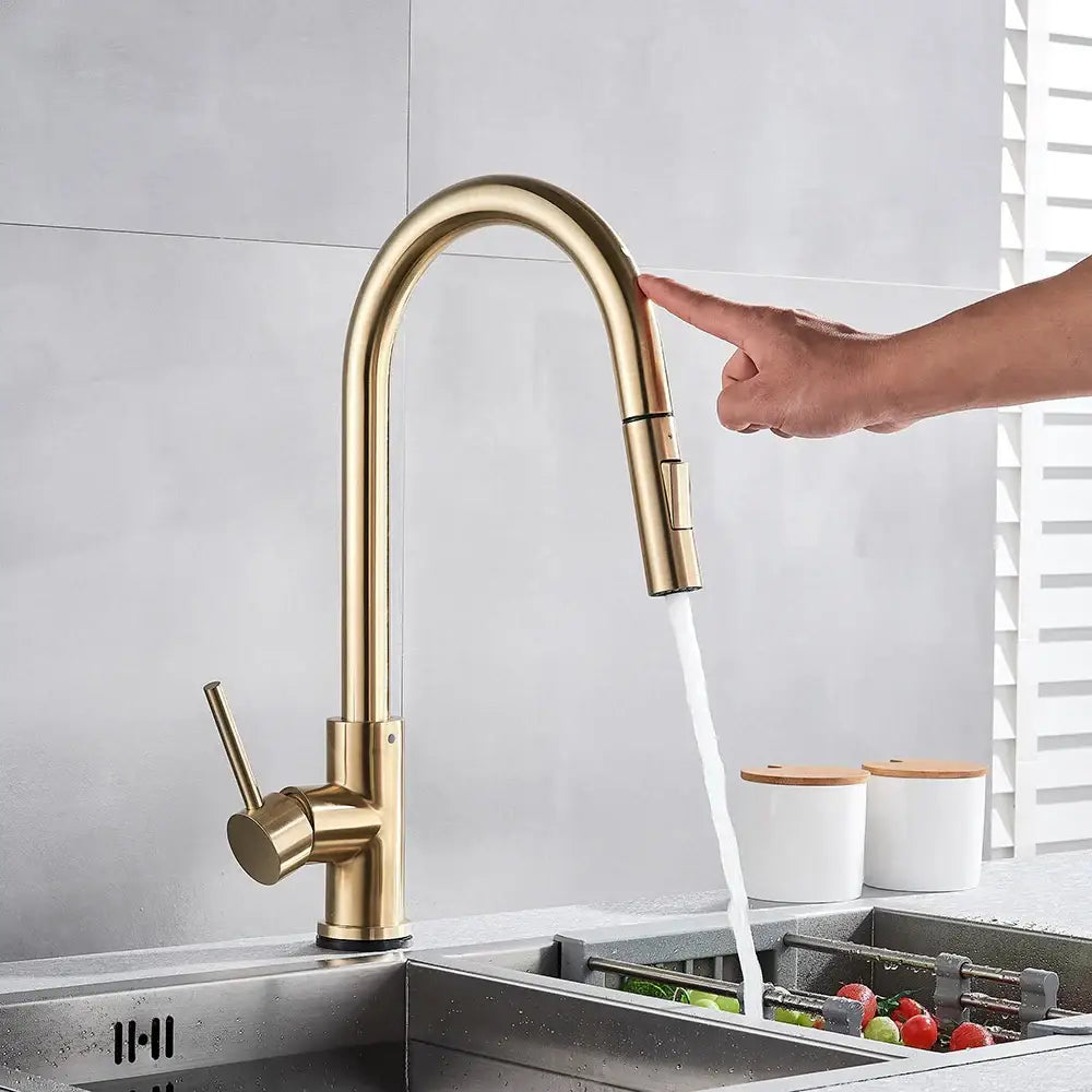 Brushed gold smart touch kitchen faucet with dual outlet modes and a sleek curved pull-down spray head design