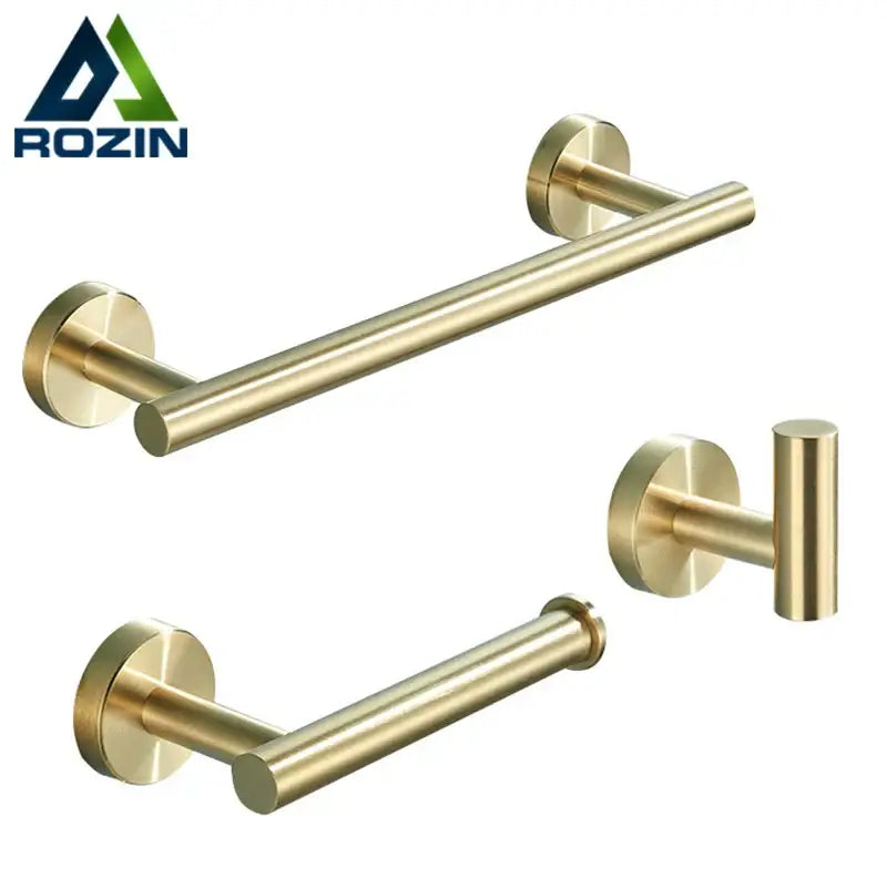 Brushed gold stainless steel bathroom accessories set featuring towel bar toilet paper holder and wall-mounted hook