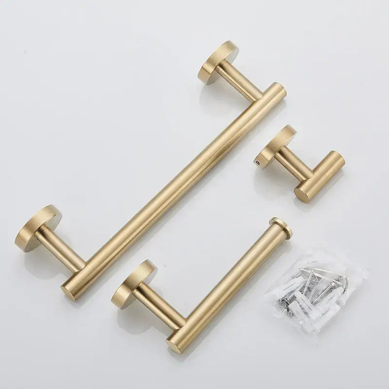 Brushed gold stainless steel drawer pulls with a sleek modern design in a bathroom accessories set