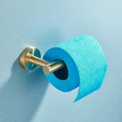A vibrant blue toilet paper roll with embossed pattern on brushed gold stainless steel bathroom accessories set holder