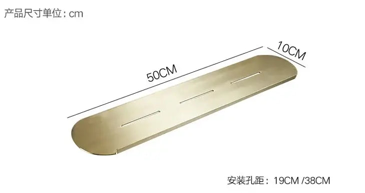 Brushed gold stainless steel bathroom storage rack with elongated metal shelf and three mounting slots for bathroom storage