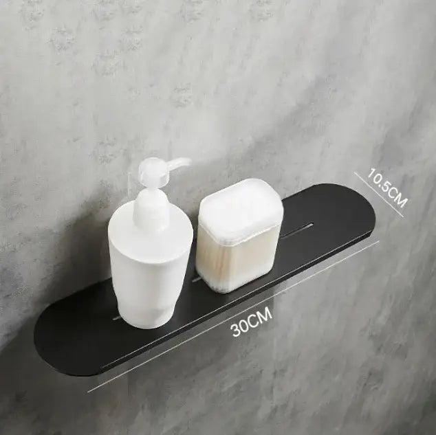 Black matte wall-mounted bathroom storage rack 30cm long with white soap dispenser and clear tissue container