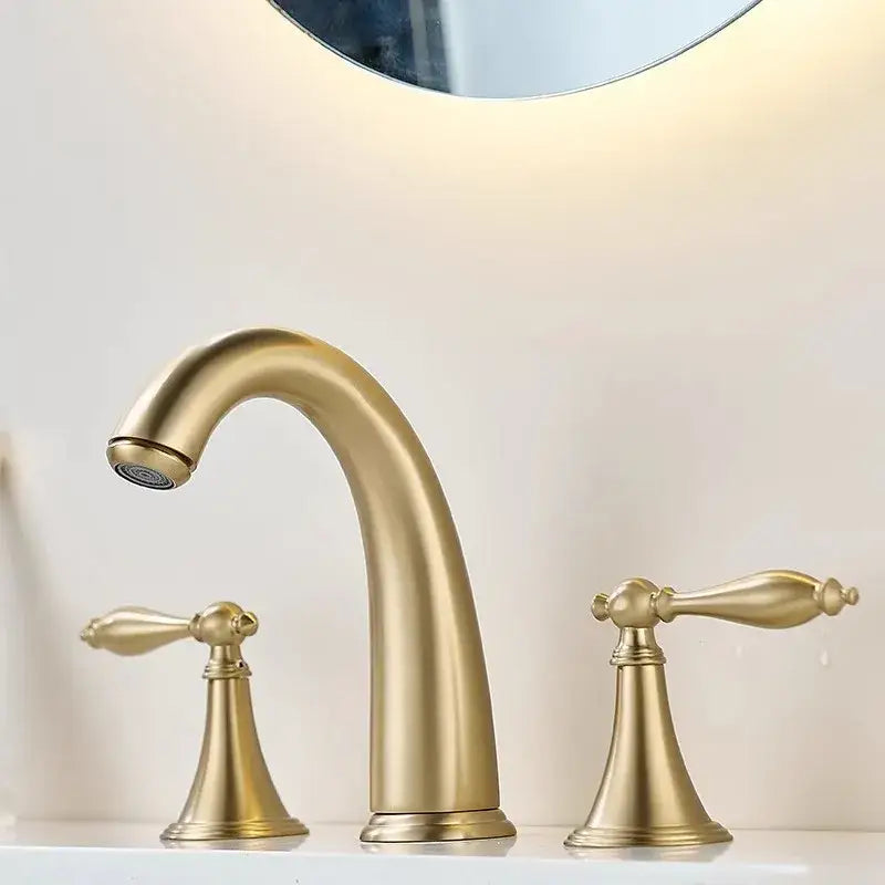 Brushed gold basin faucet by decorbites with brass material elegant curved spout and matching handles for bathroom sink