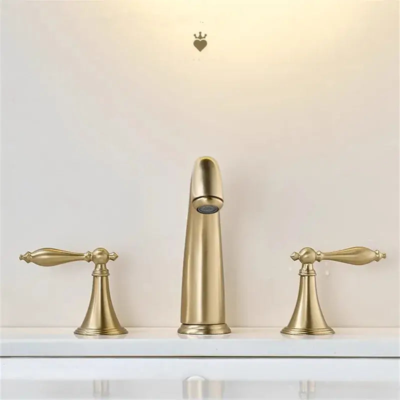 Brushed gold basin faucet with brass finish three-handle design and elegant tapered spout by decorbites brushed gold