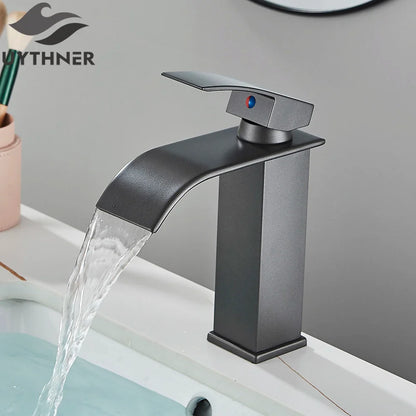 Matte black single hole basin faucet with sleek waterfall design and blue red temperature indicator for bathroom sink