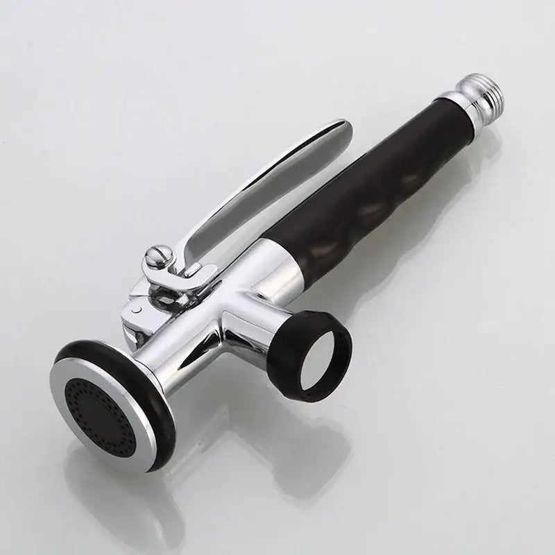 Chrome finished handheld kitchen sprayer head with black rubber grip textured for decorbites brass kitchen use