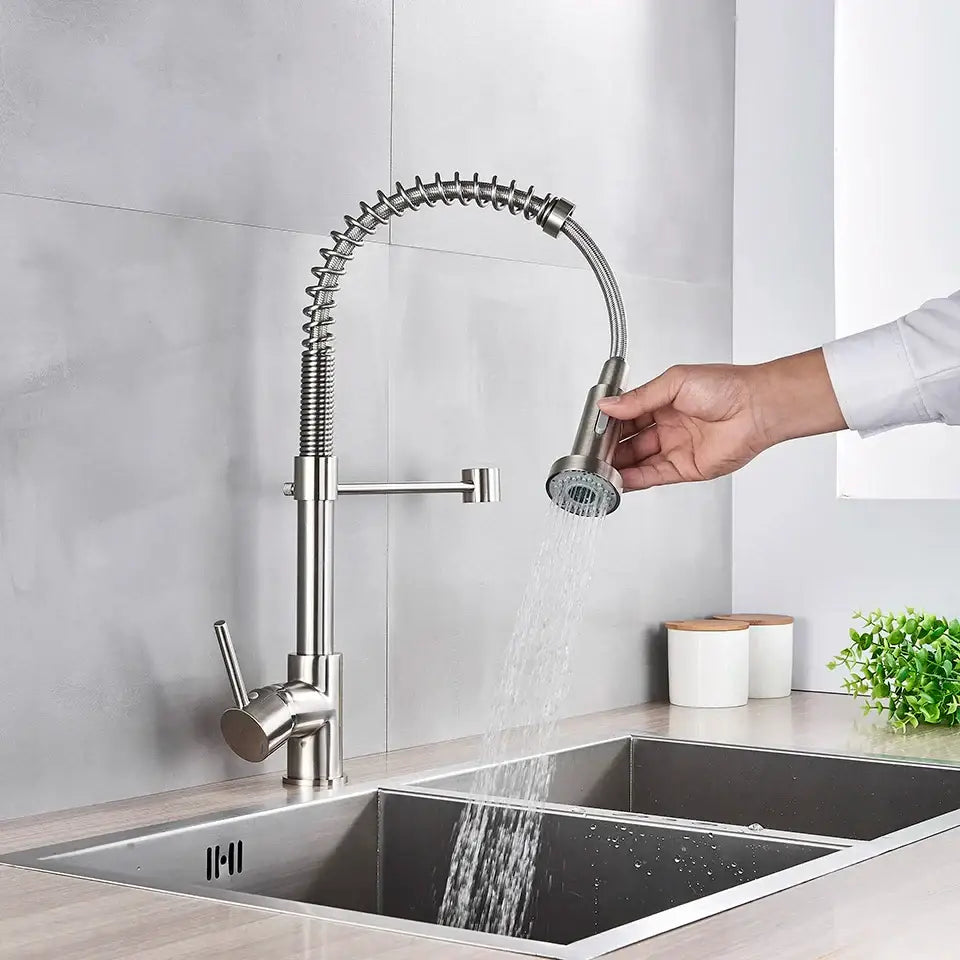 Brushed nickel kitchen faucet with a flexible coiled spring hose and pull down sprayer by decorbites brushed nickel