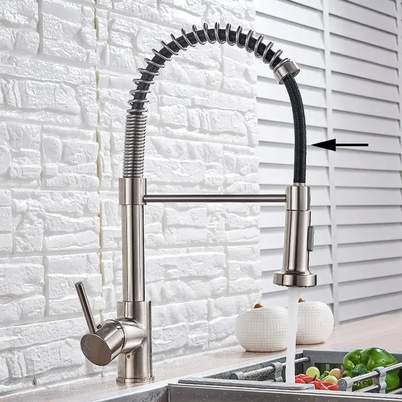 Brushed nickel kitchen faucet with flexible coiled black hose and pull down sprayer by decorbites