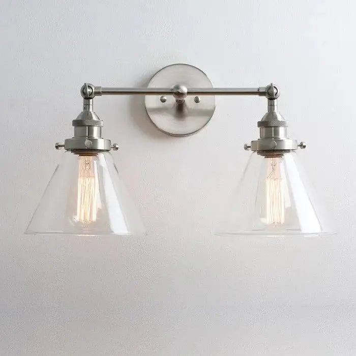 Brushed nickel funnel glass metal wall lamp with two clear glass conical shades and exposed filament bulbs decorbites funnel glass
