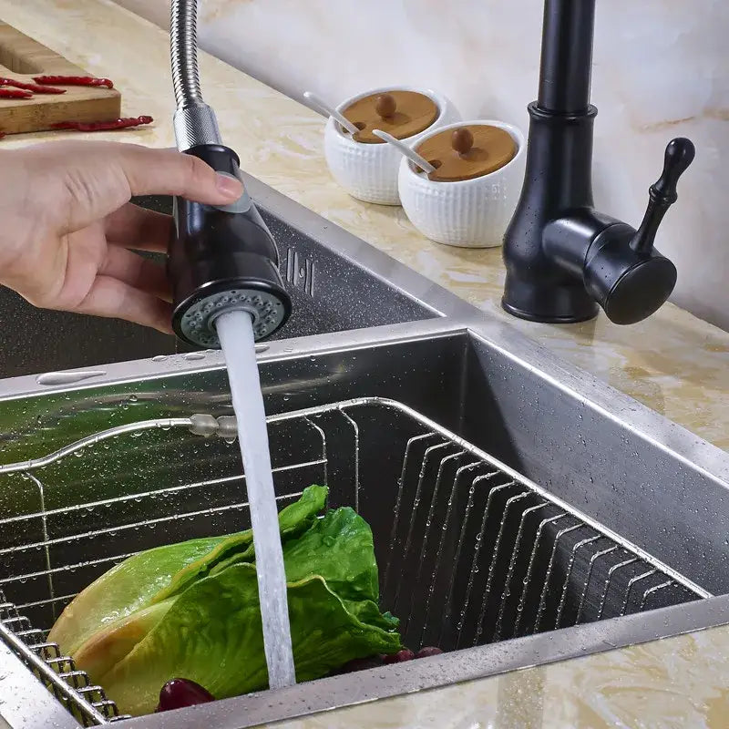Black matte pull-down kitchen faucet with flexible hose and textured grip handle for brushed nickel pull decorbites