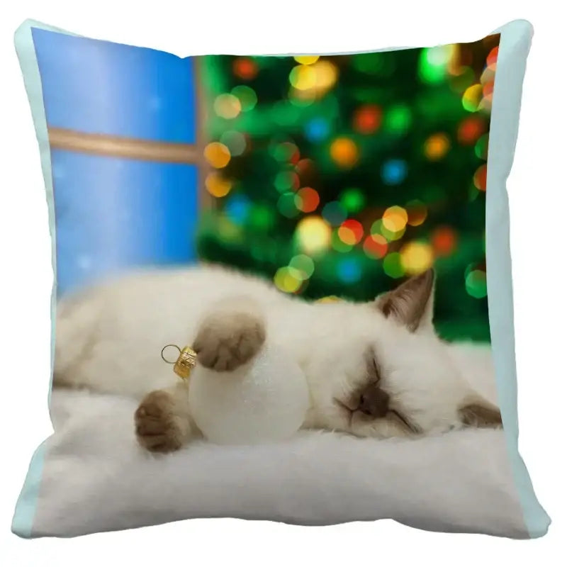 A light blue square cushion cover featuring a white cat with a gold ornament for decorbites bubble black cats decor