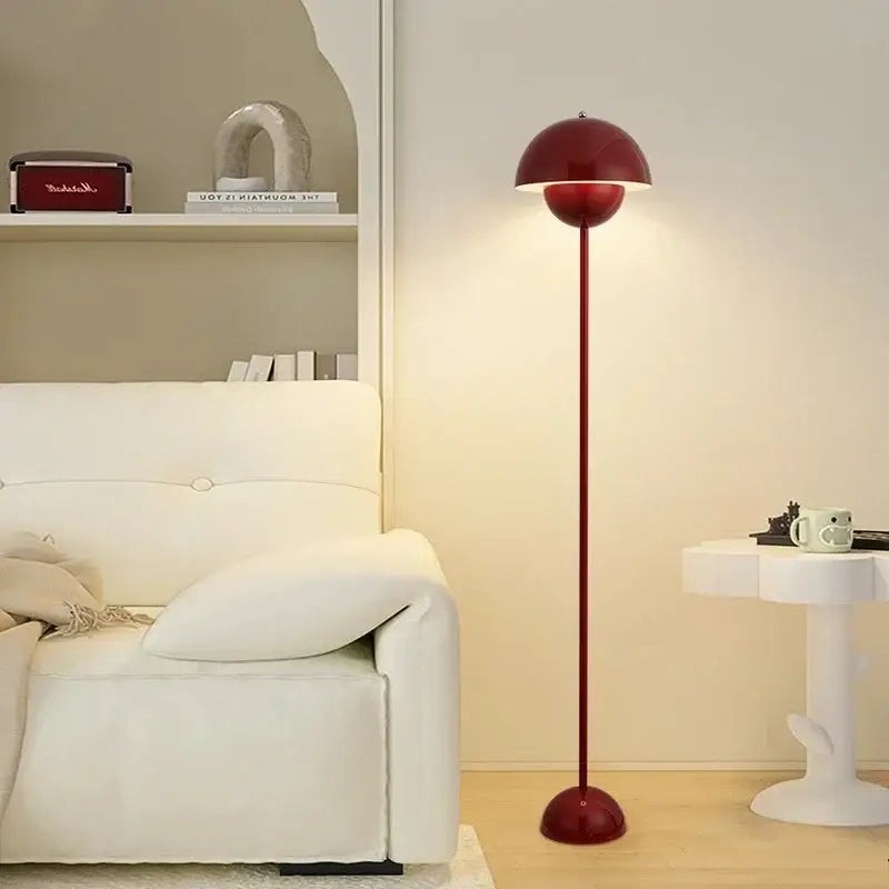 A sleek burgundy bud floor lamp with a rounded flower shade and matching base ideal for bedroom decorbites bud floor lamp