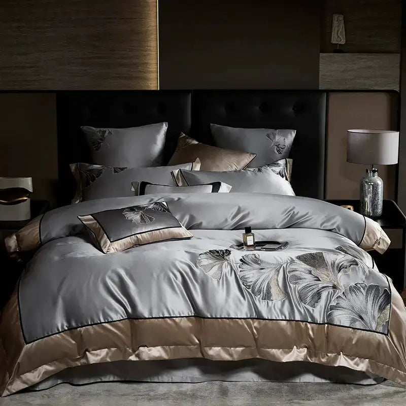 Luxury silver-gray satin duvet cover set with ginkgo leaf embroidery and champagne piping in egyptian cotton decorbites ginkgo biloba bedding set