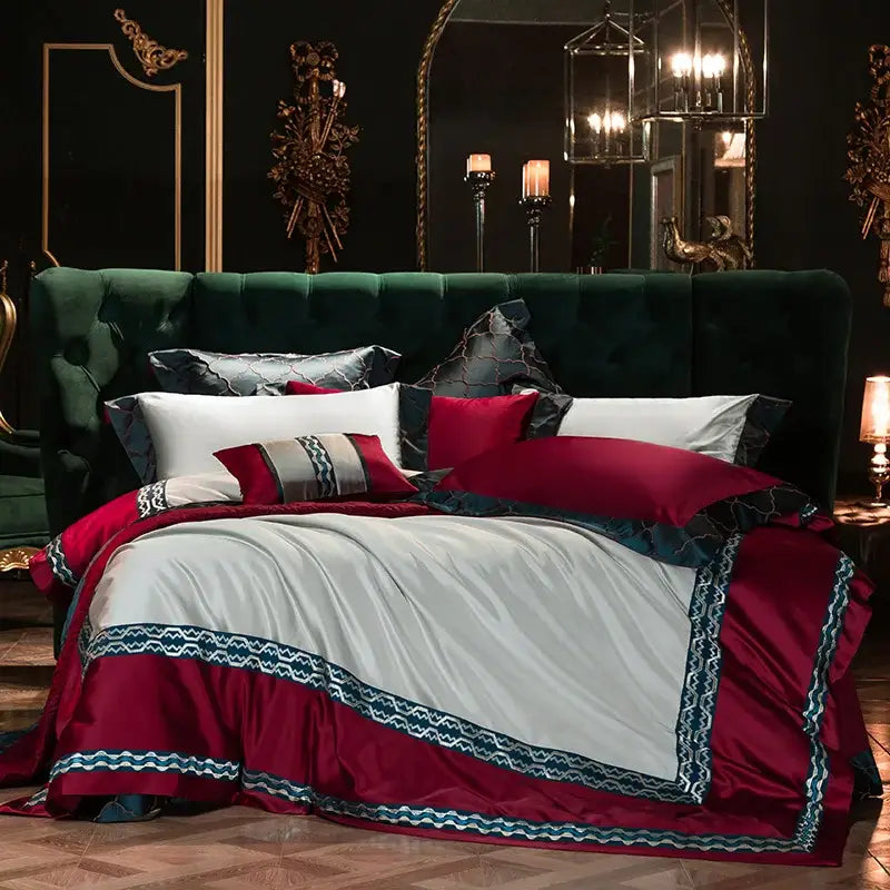 Luxurious burgundy and silver satin bedding set with intricate blue egyptian cotton embroidery trim for bedroom use