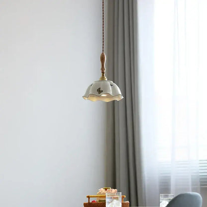Off-white butterfly ceramic led pendant lamp with scalloped edge and wooden finial for bedroom decorbites butterfly ceramic