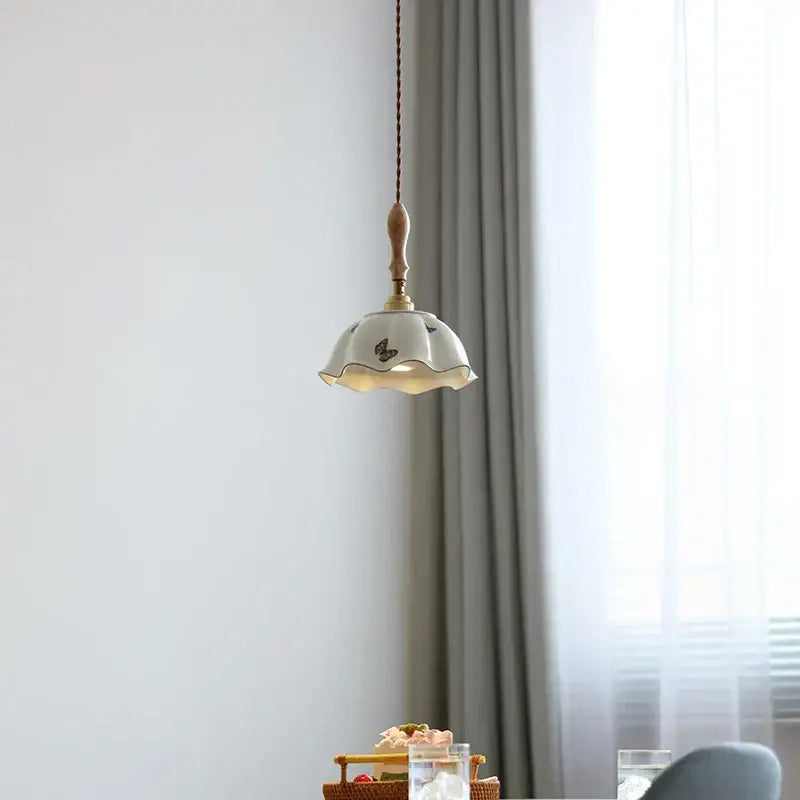 Off-white butterfly ceramic led pendant lamp with scalloped edge and wooden finial for bedroom decorbites butterfly ceramic