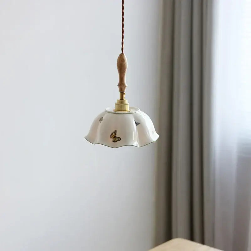 Delicate white butterfly ceramic led pendant lamp with fluted scalloped edge by decorbites for bedroom decor