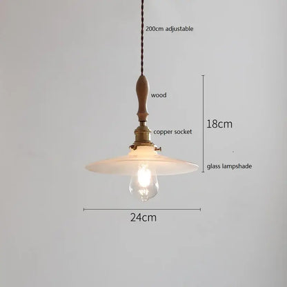 A warm-toned butterfly ceramic led pendant lamp with wooden handle brass copper socket and white fluted glass lampshade