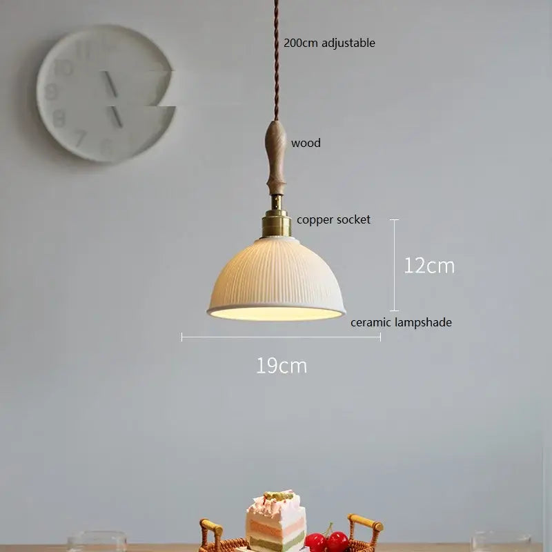 A warm-toned butterfly ceramic led pendant lamp with vertical ridges, wooden handle, and copper socket for bedroom decorbites butterfly ceramic lighting