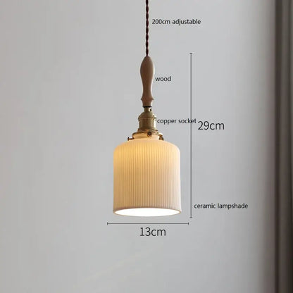 A warm-toned butterfly ceramic led pendant lamp with vertical ridges and wooden handle for bedroom decorbites butterfly ceramic