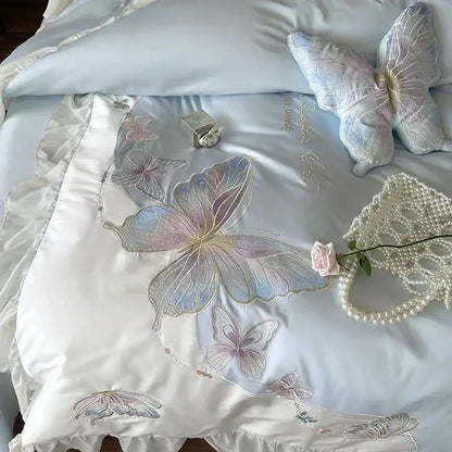 Light blue cotton bedding set featuring decorbites butterfly embroidery and lace ruffles for elegant bedroom decor