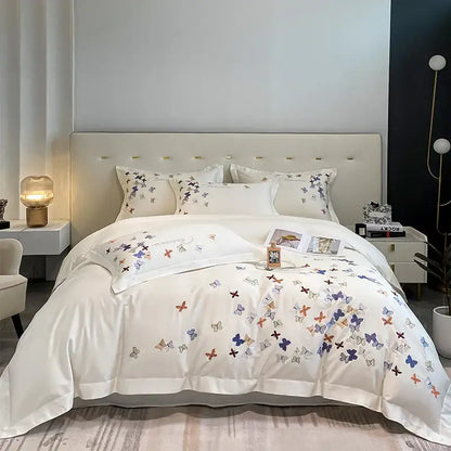 White cotton bedding set with delicate pastel butterfly embroidery for elegant bedroom decor by decorbites butterfly embroidery
