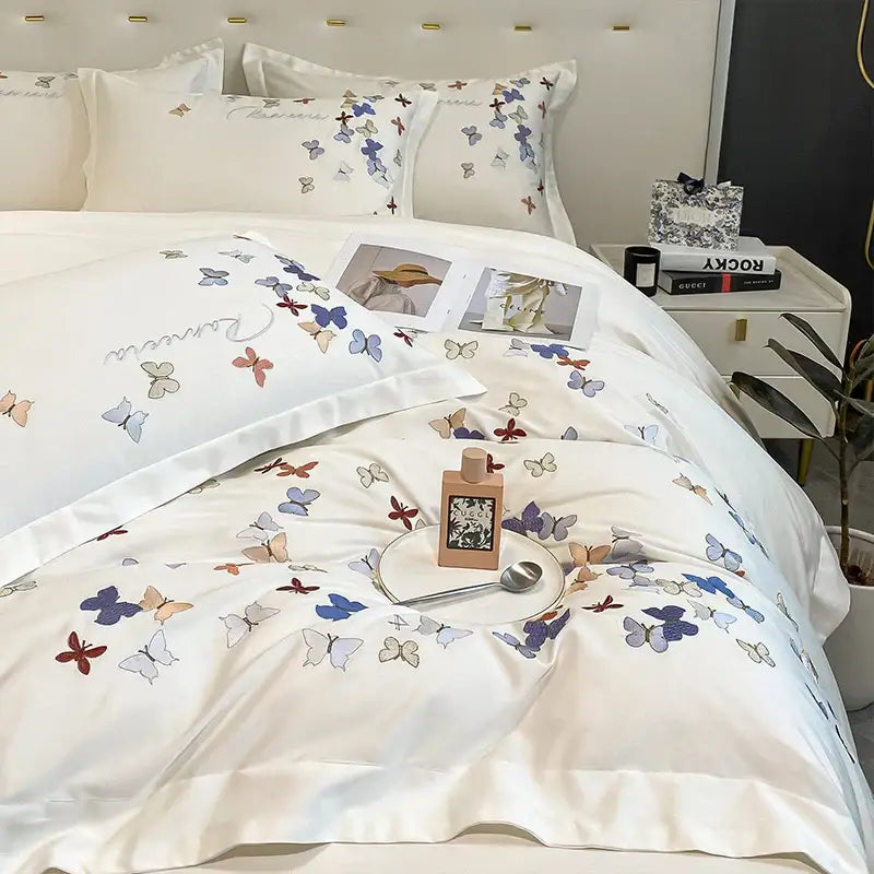 White satin bedding set with decorbites butterfly embroidery in blue purple and beige on cotton for bedroom decor