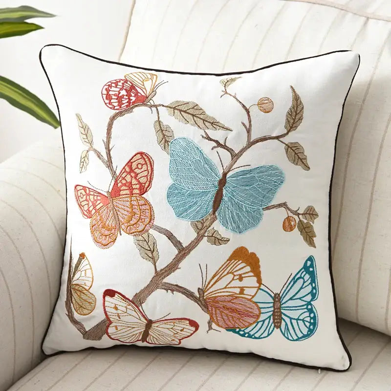 White cotton pillow cover with embroidered blue orange and red butterflies on branch decorbites butterfly floral design