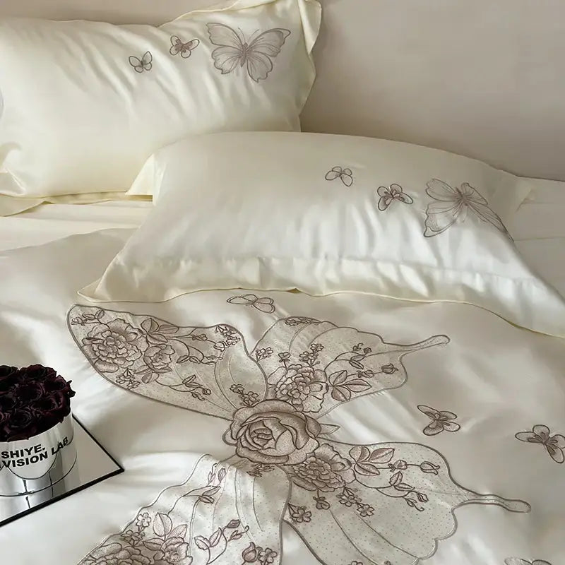 Cream satin bedding set with butterfly flowers embroidery in soft gray for elegant bedroom decorbites butterfly flowers