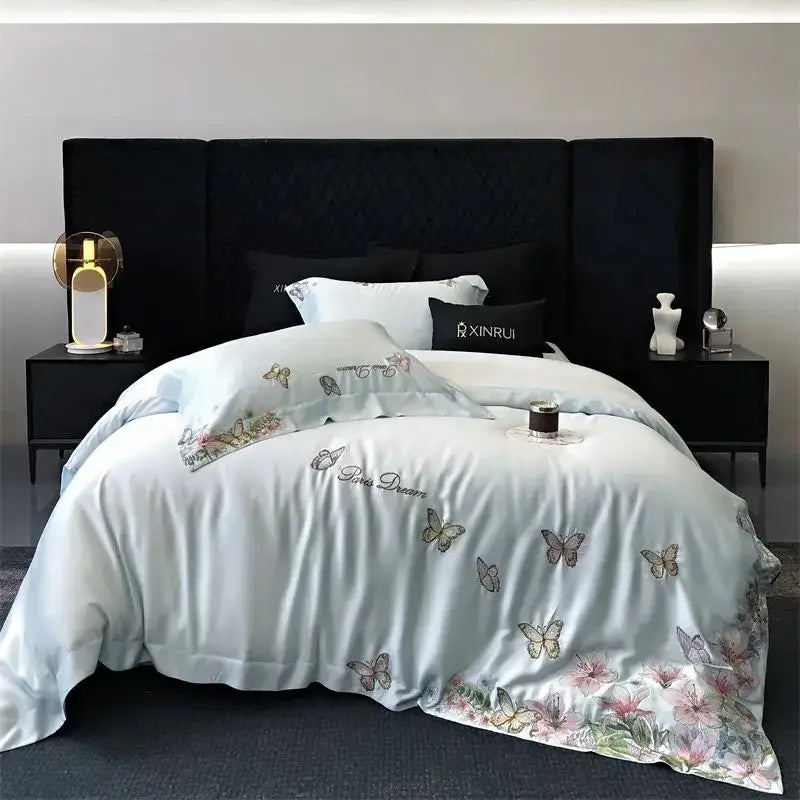 Light blue satin bedding set with delicate butterfly flowers embroidery decorbites for elegant bedroom decor