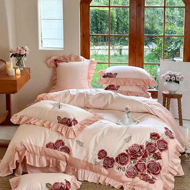 Pink satin bedding set with butterfly flowers embroidery and ruffled edges for elegant bedroom decorbites decor