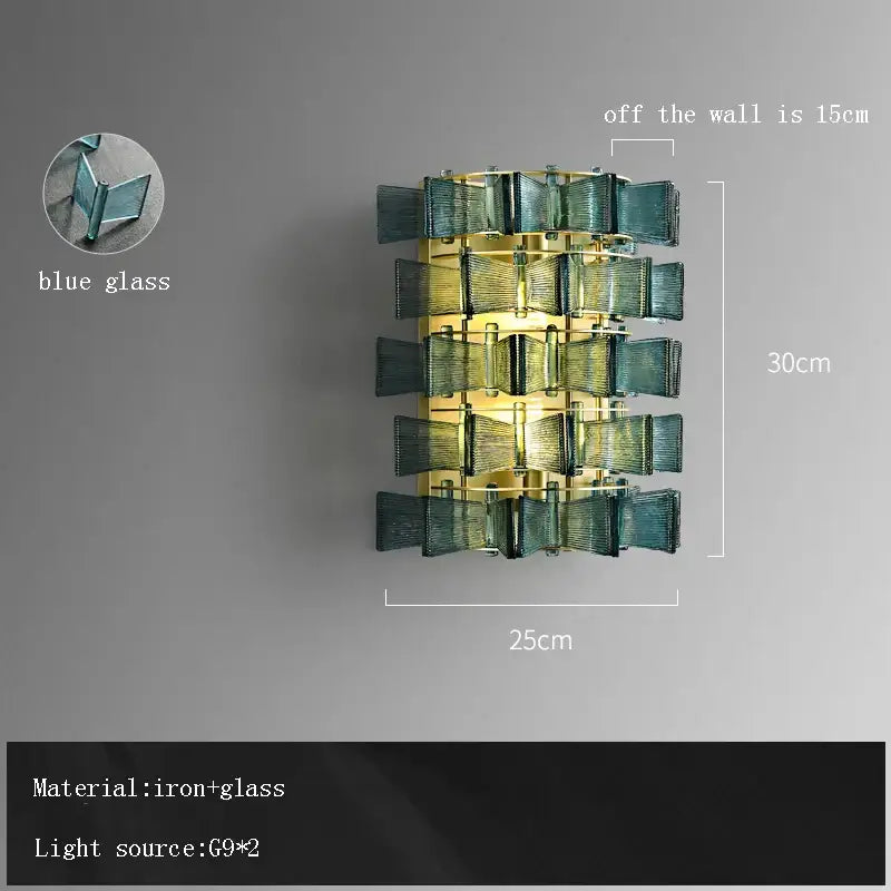 A decorbites butterfly glass chandelier with stacked textured blue glass panels and a brass iron frame for dining room decor