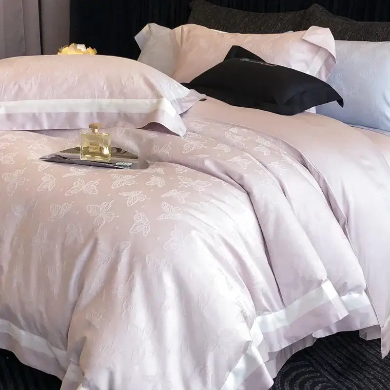 A soft lavender satin duvet cover with white butterfly embroidery and trim from decorbites butterfly jacquard bedding set