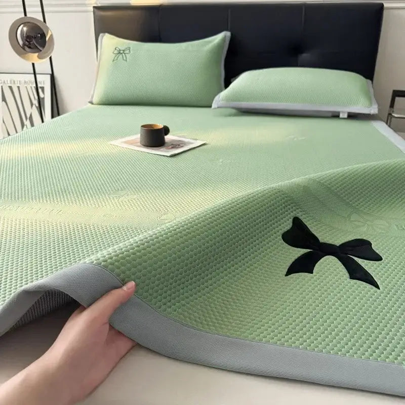 Light green textured cooling mattress pad with butterfly knot jacquard bow and gray border cool mat decorbites butterfly knot