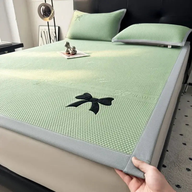 Light green mesh cool mat with black embroidered butterfly knot jacquard bow and gray border from decorbites bedroom cushion set