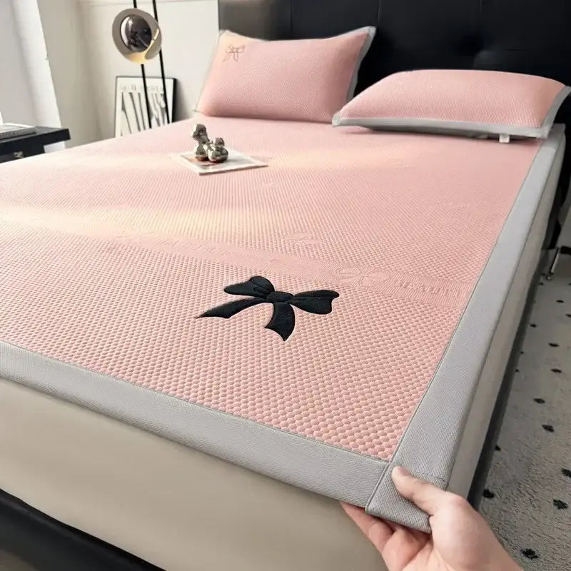 Pink mesh cooling mattress pad with black embroidered bow and gray border for decorbites butterfly knot jacquard cool mat set
