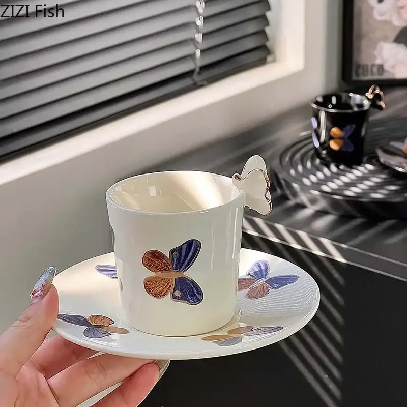 White ceramic butterfly pattern ceramic cup with butterfly-shaped handle and matching saucer for cream and black dining room decorbites butterfly pattern
