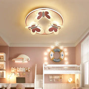 Butterfly pink ceiling light with three illuminated white and maroon butterfly designs and warm metallic border for kids room decorbites butterfly pink