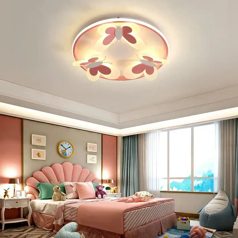 Round ceiling light with three pink and white butterfly designs emitting warm glow decorbites butterfly pink ceiling light