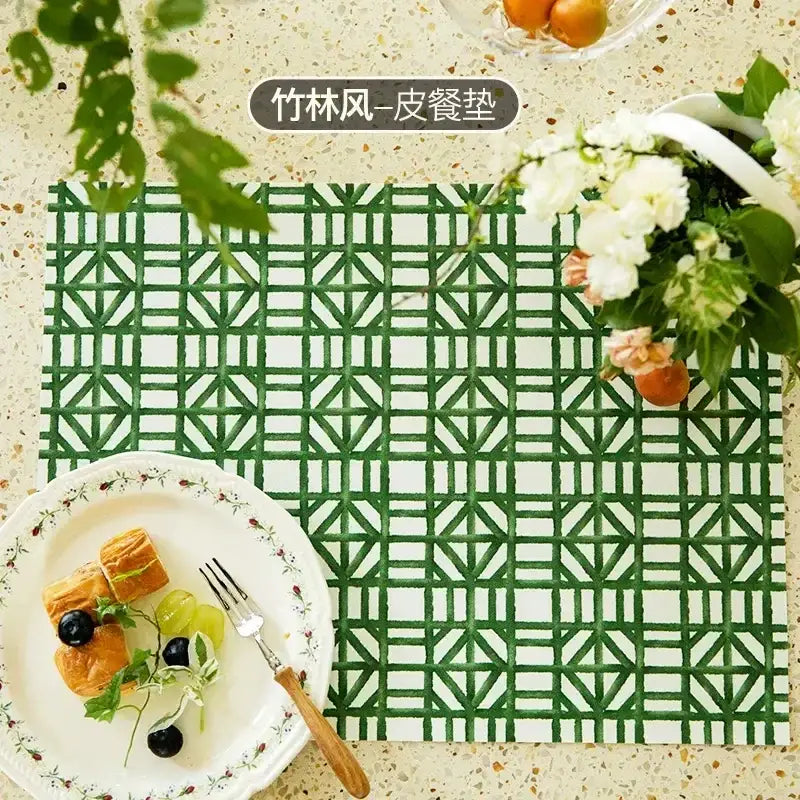 Green geometric-patterned leather placemat complementing butterfly print throw pillow for decorbites butterfly print decor