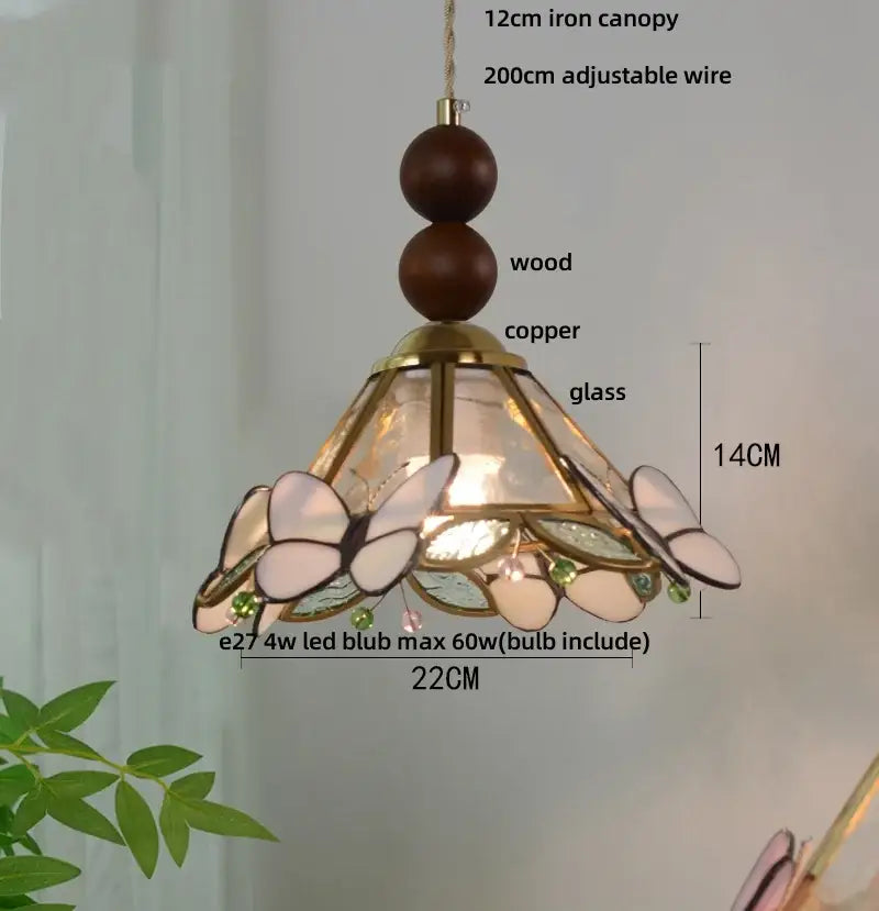 Butterfly tiffany glass pendant light with blue and green shade, copper frame, wooden beads, and green gemstone accents