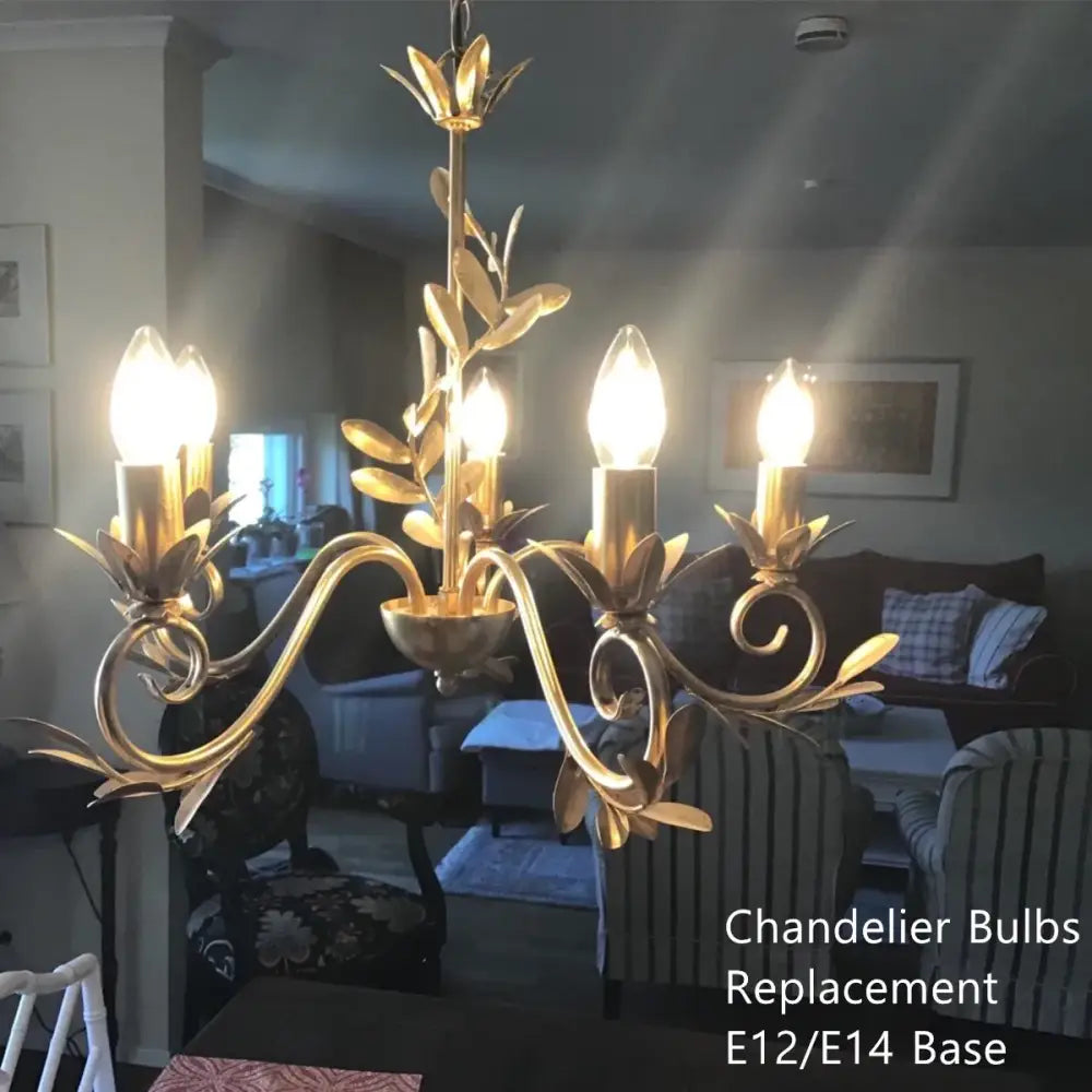 Gold-toned chandelier with ornate leaf and vine design featuring five illuminated decorbites c35 led dimmable glass candle bulbs