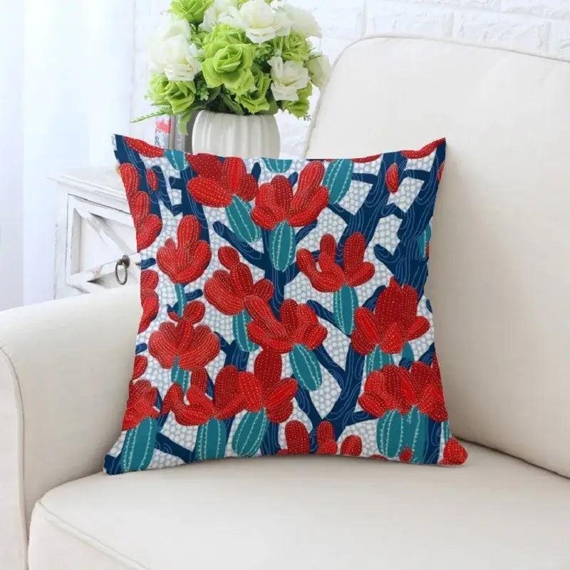 A decorative pillowcase with cactus hand painting features bold red teal and navy floral patterns on white background for sofa decorbites